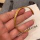 AAA Fake Celine Yellow Gold Engraved Open Bracelet (3)_th.jpg